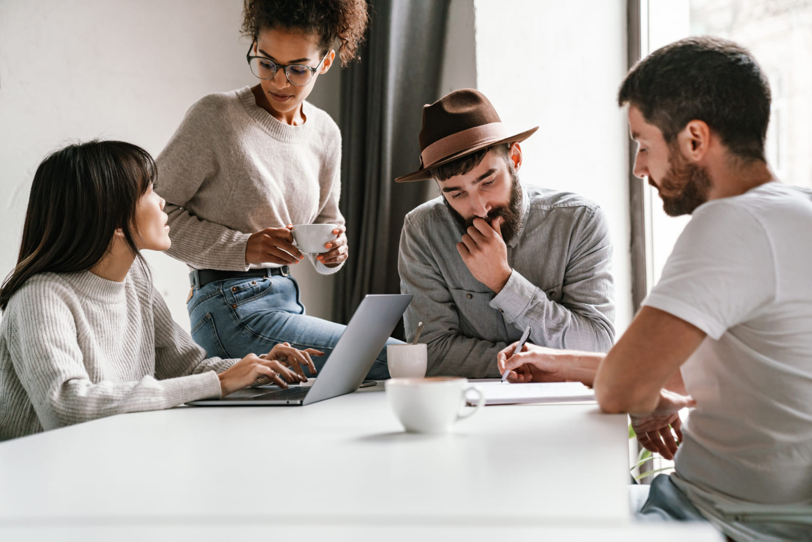 How is a dedicated resource model different from other engagement schemes?