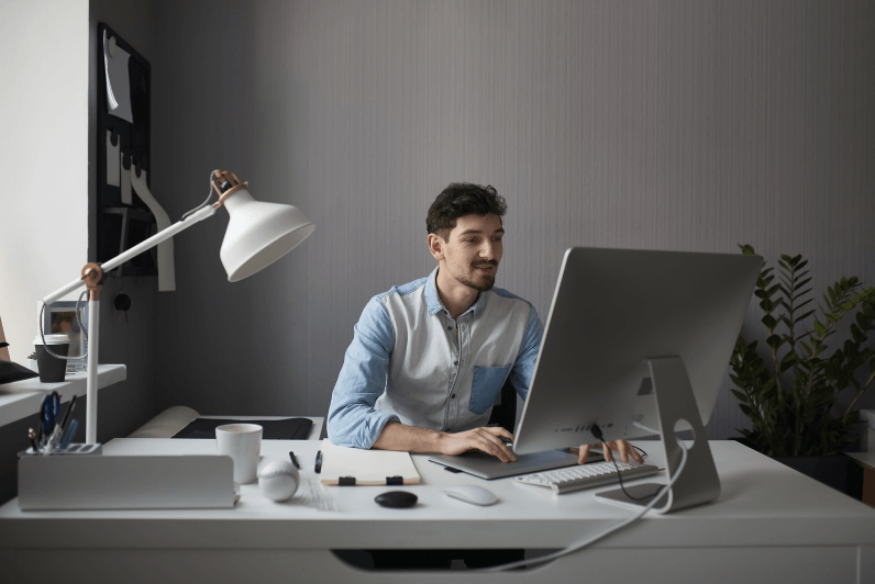 young male designer using graphics tablet while working with com 2 young male designer using graphics tablet while working with com 2
